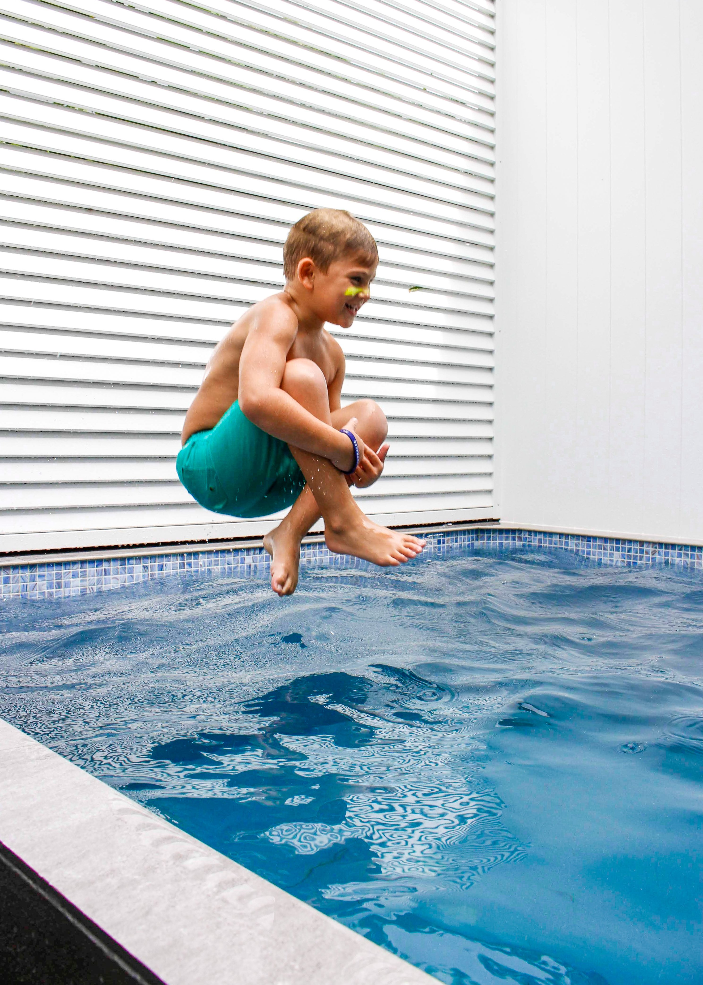 Young boy jumps into Plungie pool